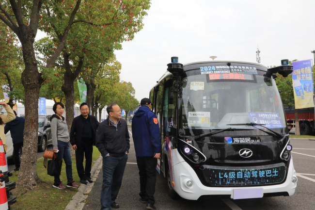 央视聚焦自动驾驶加速“上路”，苏州金龙领跑智慧出行新时代插图1